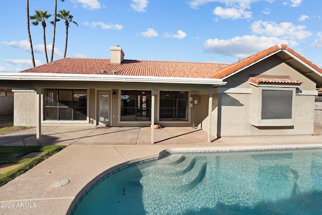 rear view of property with a patio