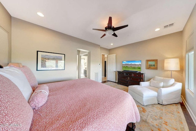 bedroom featuring a ceiling fan, baseboards, visible vents, and recessed lighting