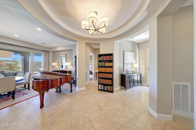 interior space with light tile patterned flooring, a notable chandelier, recessed lighting, baseboards, and visible vents