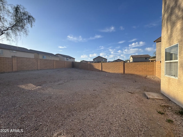 view of yard featuring a fenced backyard