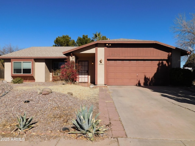 ranch-style home with a garage