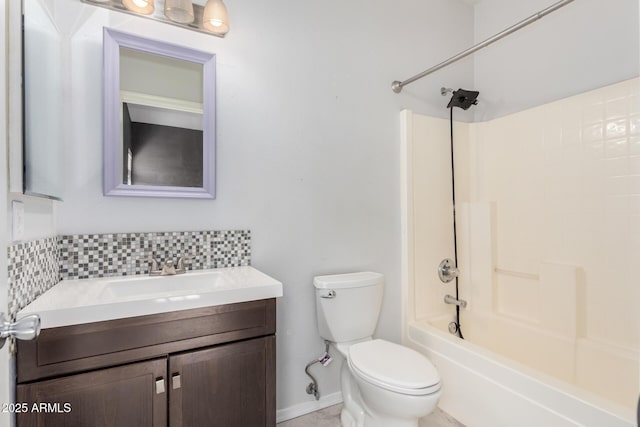 full bathroom with bathing tub / shower combination, decorative backsplash, toilet, and vanity