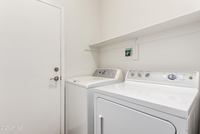 laundry room featuring laundry area and independent washer and dryer