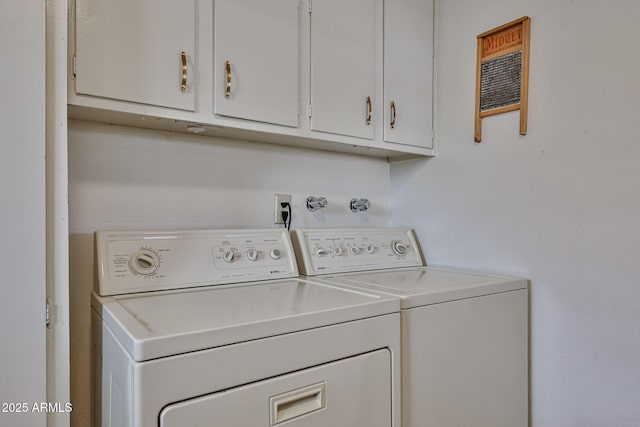 washroom with washer and dryer