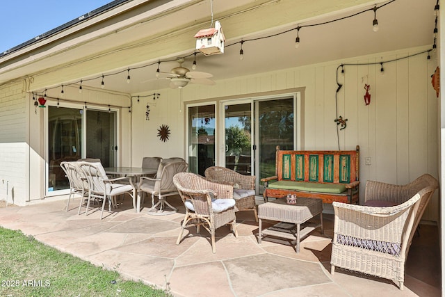 view of patio featuring an outdoor hangout area, outdoor dining space, and a ceiling fan