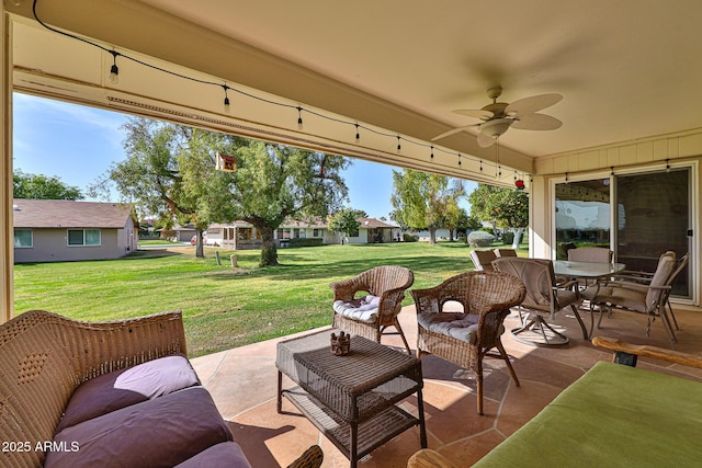 view of patio / terrace with ceiling fan and outdoor lounge area