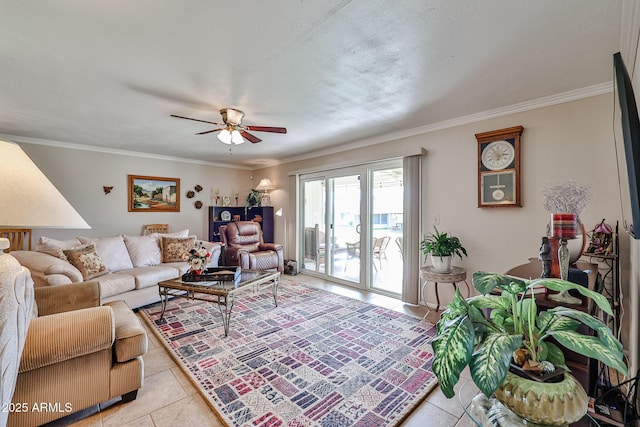 living area with light tile patterned floors, ornamental molding, and a ceiling fan