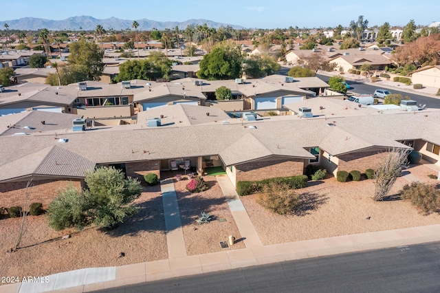 birds eye view of property featuring a mountain view