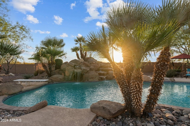 view of swimming pool featuring a patio area and pool water feature