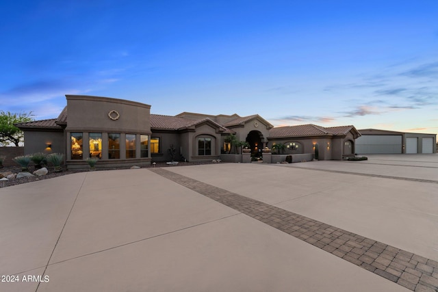 view of front of property with a garage