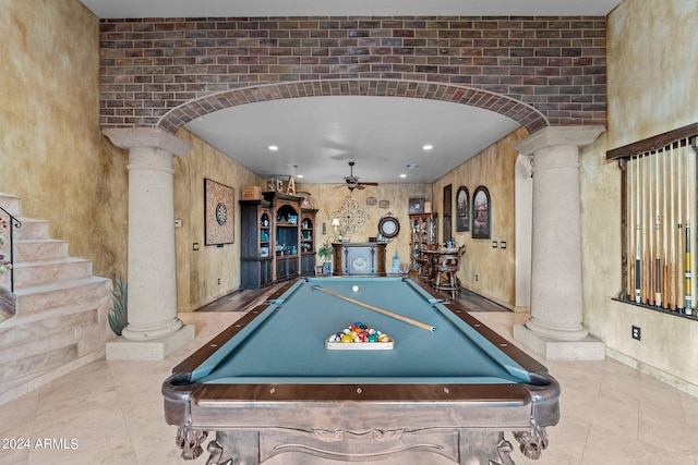 game room featuring ceiling fan, pool table, light tile floors, and ornate columns