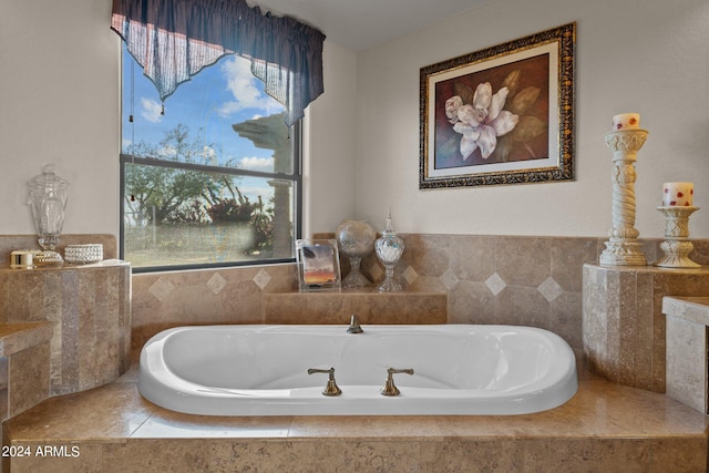 bathroom with tiled bath