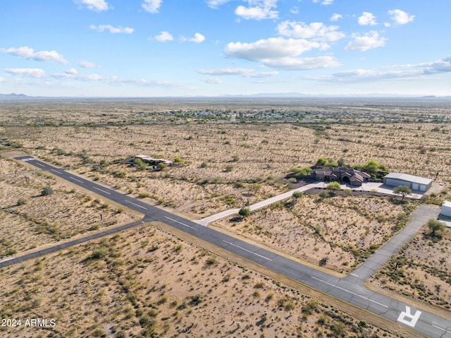 birds eye view of property with a rural view