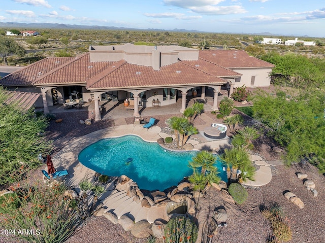 view of pool with a patio