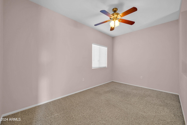 carpeted empty room with ceiling fan