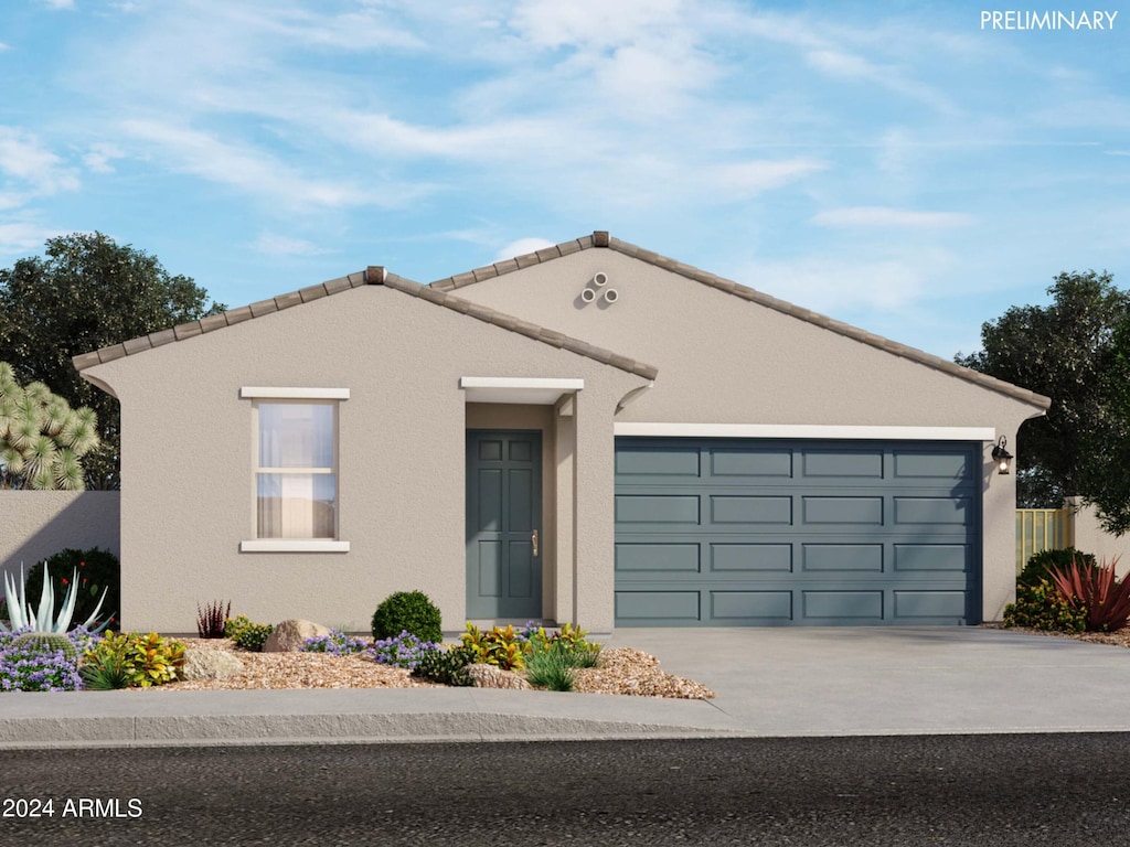 ranch-style home featuring a garage