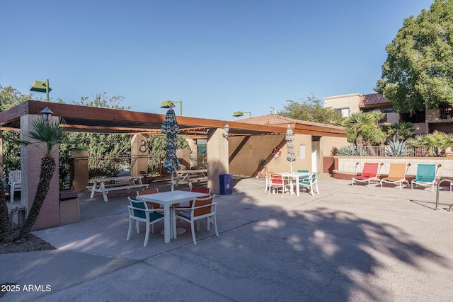 view of patio featuring a pergola