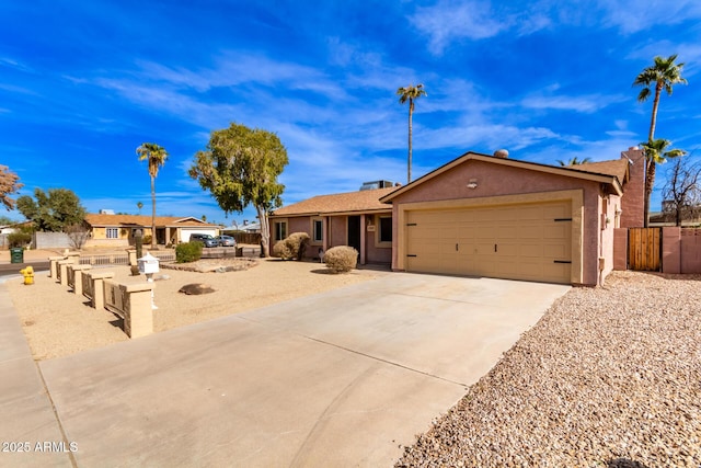 ranch-style home featuring a garage