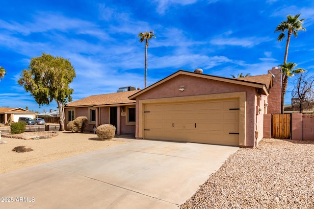 ranch-style house featuring a garage