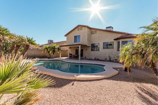 view of swimming pool with a patio area