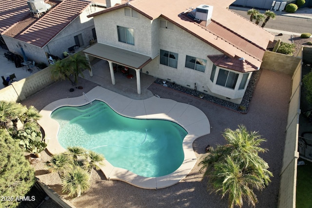 view of pool featuring a patio