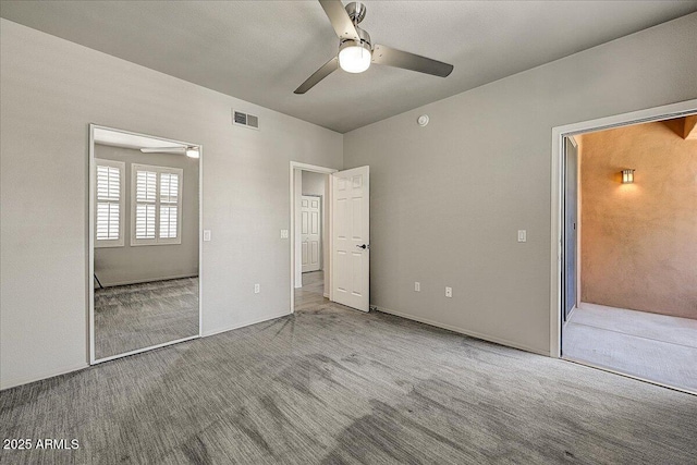 20100 N 78th Pl Unit 2019, Scottsdale, AZ 85255 - unfurnished bedroom featuring carpet flooring and a ceiling fan