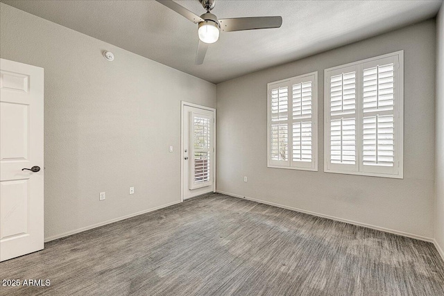 20100 N 78th Pl Unit 2019, Scottsdale, AZ 85255 - unfurnished room featuring a ceiling fan and baseboards