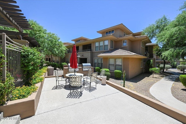 20100 N 78th Pl Unit 2019, Scottsdale, AZ 85255 - view of patio with a grill