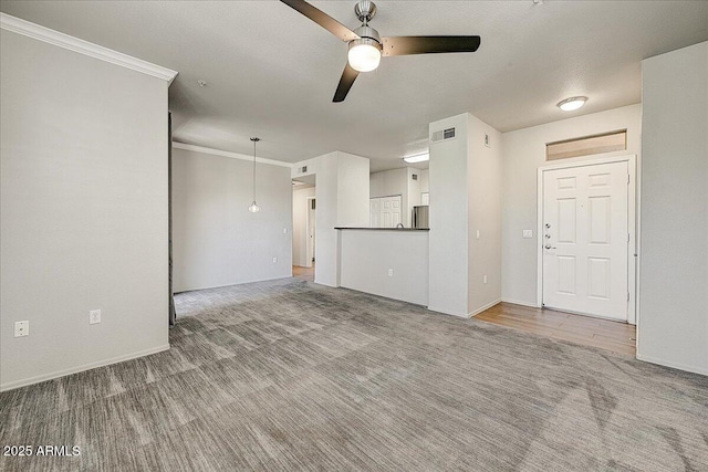 20100 N 78th Pl Unit 2019, Scottsdale, AZ 85255 - unfurnished living room featuring ceiling fan, carpet flooring, and ornamental molding