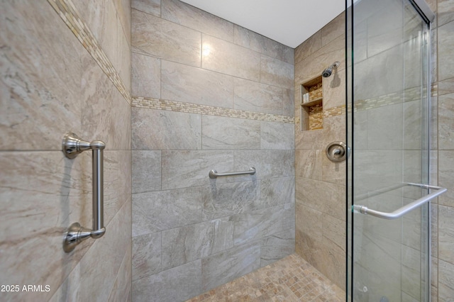 bathroom with an enclosed shower