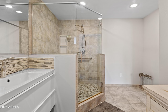 bathroom with tile patterned floors and an enclosed shower