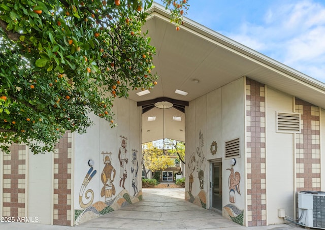 doorway to property with cooling unit