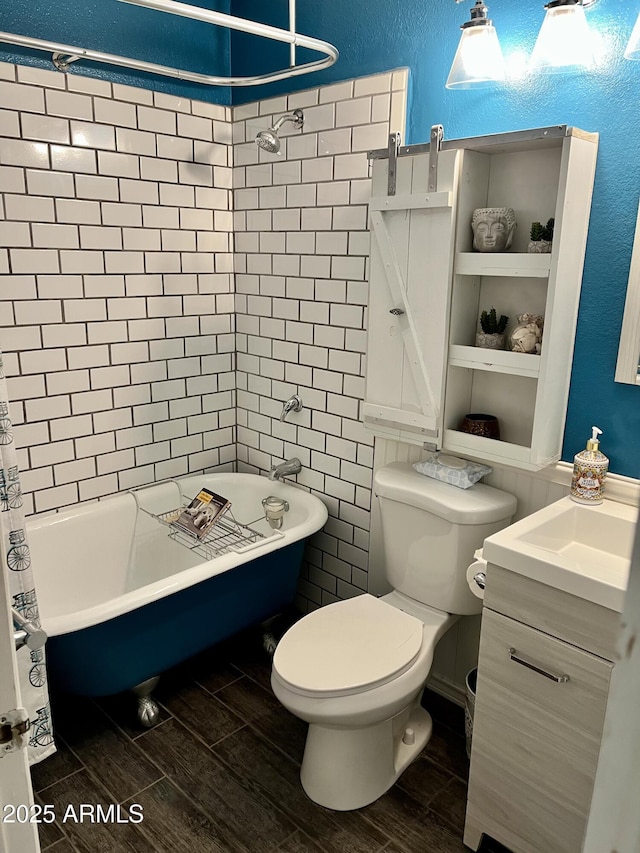 full bathroom with shower / bath combo, vanity, and toilet