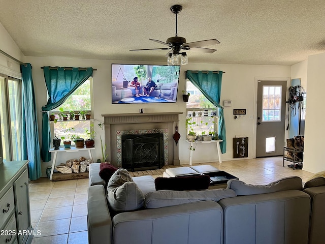 living room with light tile patterned flooring and a healthy amount of sunlight