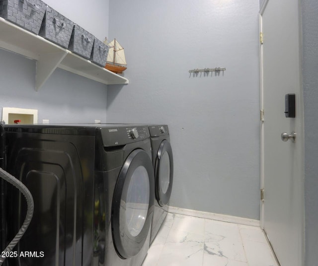 washroom featuring independent washer and dryer