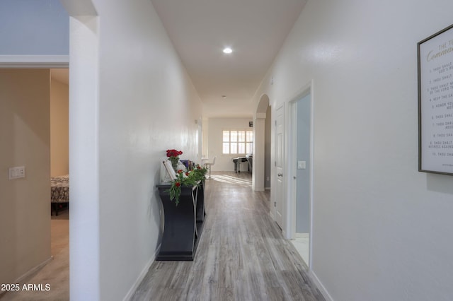 corridor featuring light hardwood / wood-style flooring