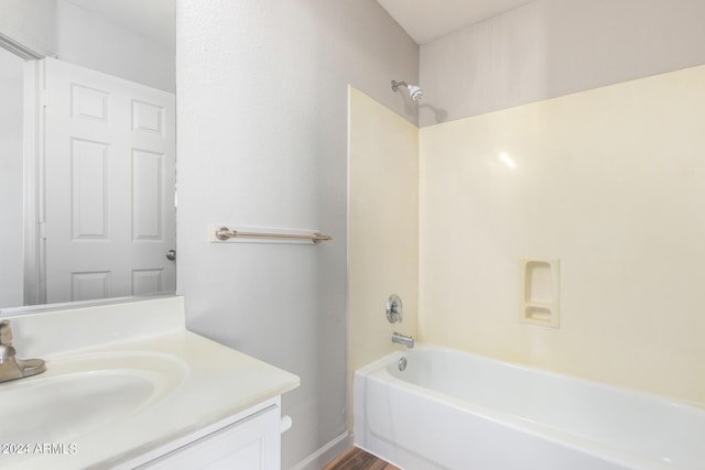 bathroom with vanity and bathtub / shower combination