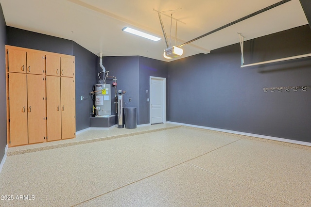 garage featuring a garage door opener and gas water heater