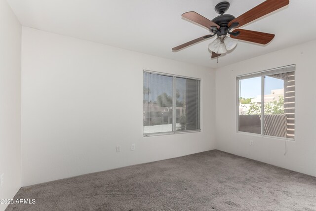 11260 N 92nd St Unit 2102, Scottsdale, AZ 85260 - carpeted empty room with a ceiling fan