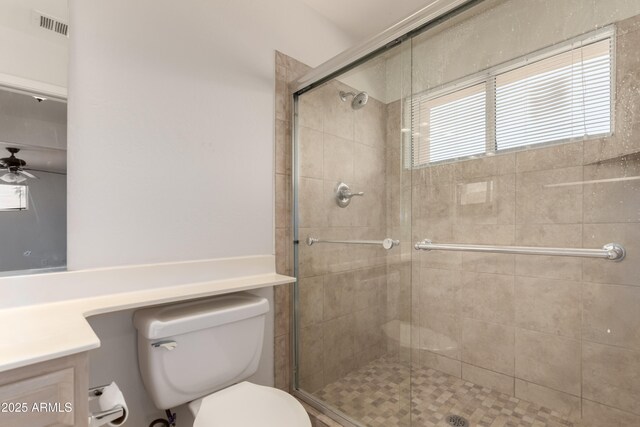 11260 N 92nd St Unit 2102, Scottsdale, AZ 85260 - full bathroom featuring vanity, a shower stall, and a ceiling fan