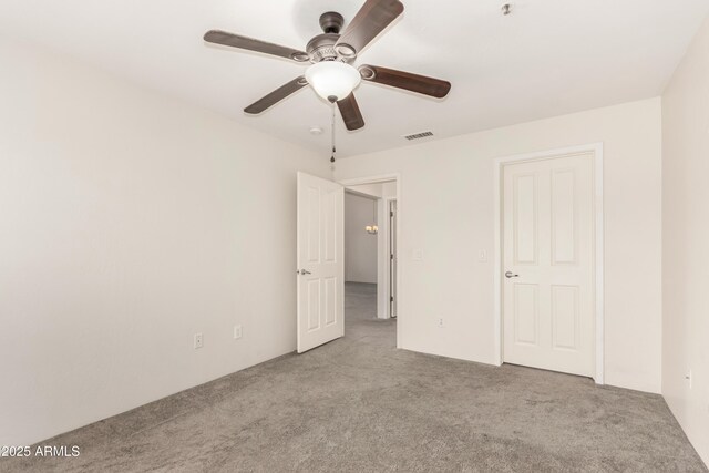 11260 N 92nd St Unit 2102, Scottsdale, AZ 85260 - unfurnished bedroom with carpet flooring and ceiling fan