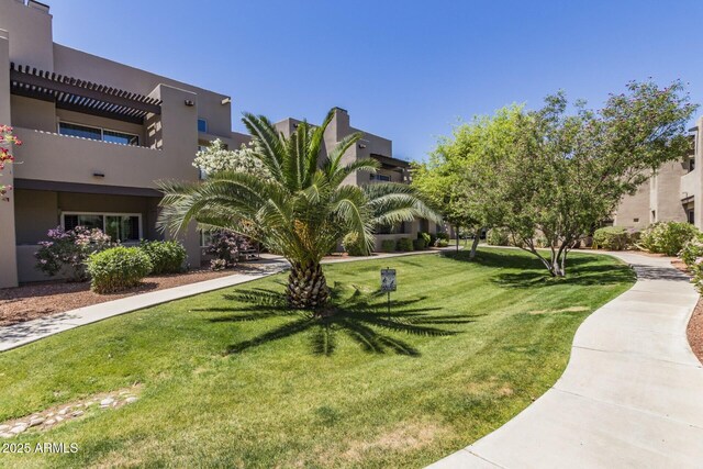 11260 N 92nd St Unit 2102, Scottsdale, AZ 85260 - view of home's community with a lawn