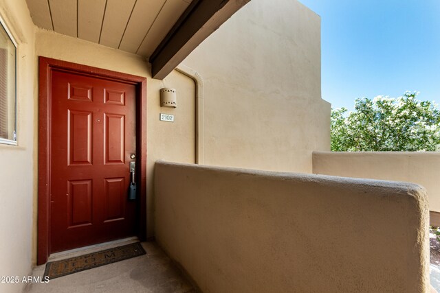 11260 N 92nd St Unit 2102, Scottsdale, AZ 85260 - entrance to property featuring stucco siding and a balcony