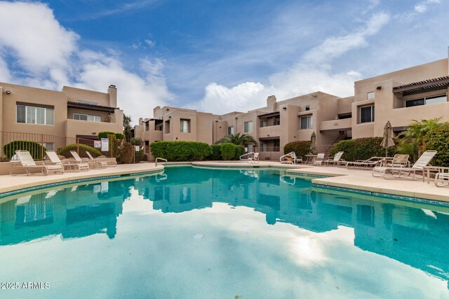 11260 N 92nd St Unit 2102, Scottsdale, AZ 85260 - community pool with a patio and a residential view