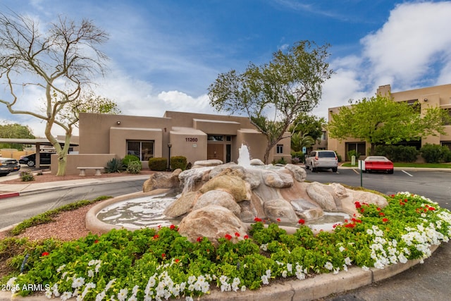 11260 N 92nd St Unit 2102, Scottsdale, AZ 85260 - view of building exterior with uncovered parking