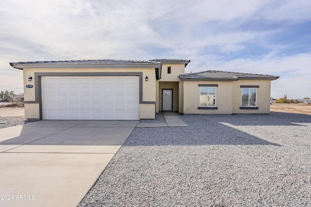 view of front of property featuring a garage