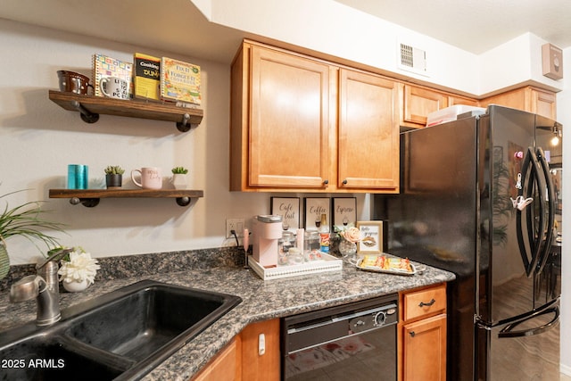 8787 E Mountain View Rd Unit 1110, Scottsdale, AZ 85258 - kitchen with black appliances, open shelves, and dark stone countertops