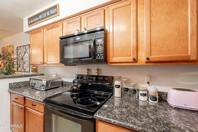 8787 E Mountain View Rd Unit 1110, Scottsdale, AZ 85258 - kitchen featuring black appliances and dark stone counters