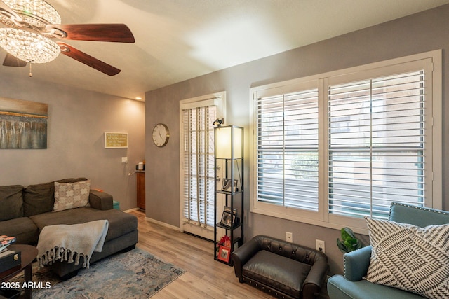 8787 E Mountain View Rd Unit 1110, Scottsdale, AZ 85258 - living room with ceiling fan and wood finished floors