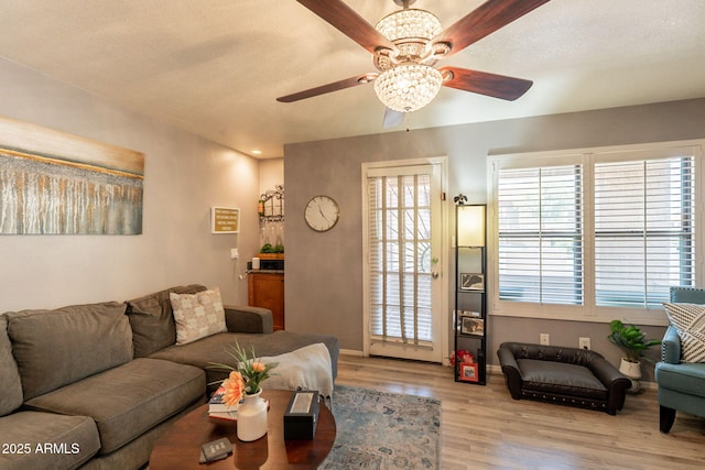 8787 E Mountain View Rd Unit 1110, Scottsdale, AZ 85258 - living area with a ceiling fan and wood finished floors